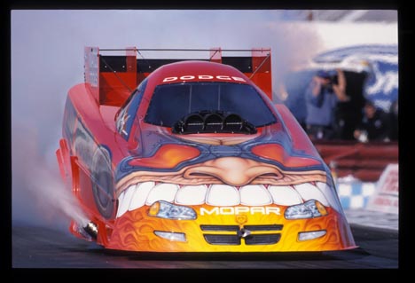 Gary Scelzi burns out in his new Schumacher/Oakley Dodge.