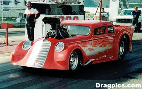 Bruce Boland runs the good stuff in this 1933 Willys Coupe. Photo by Joe Barrett