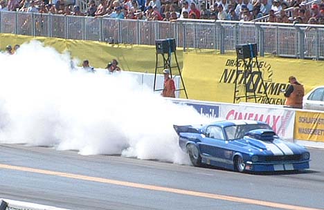 Pro Mod Mustang lays down an incredible burnout at the Nitro Olympics at Hockenheim, Germany. Photo by David James