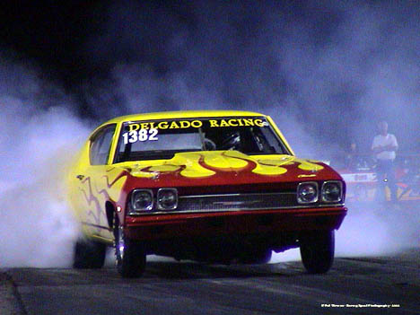 The Delgado Racing Chevelle burns out in a weird light. Photo by Pat Gleason