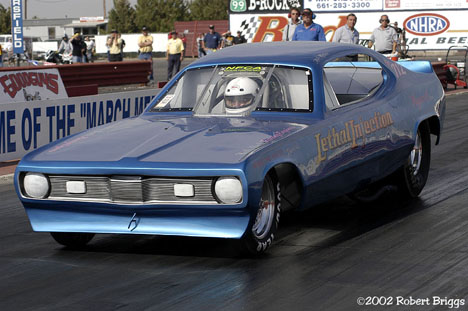 Mike Messner's Lethal Injection rear engine funny car was a cool site at Bakersfield. Photo by Robert Briggs