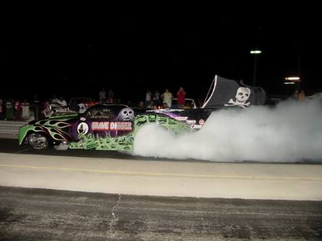 With the Jolly Roger flying, the Grave Digger does an eighth mile burnout! Roger Richards photo