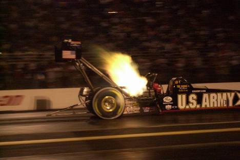 Tony Schumacher lights the night sky at the Keystone Nationals. Photo by Greg Gage