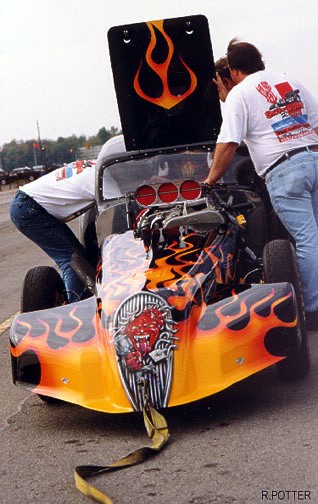 Frank Jonkman and crew prepare the Fiat for battle in 1999. Photo by Rob Potter